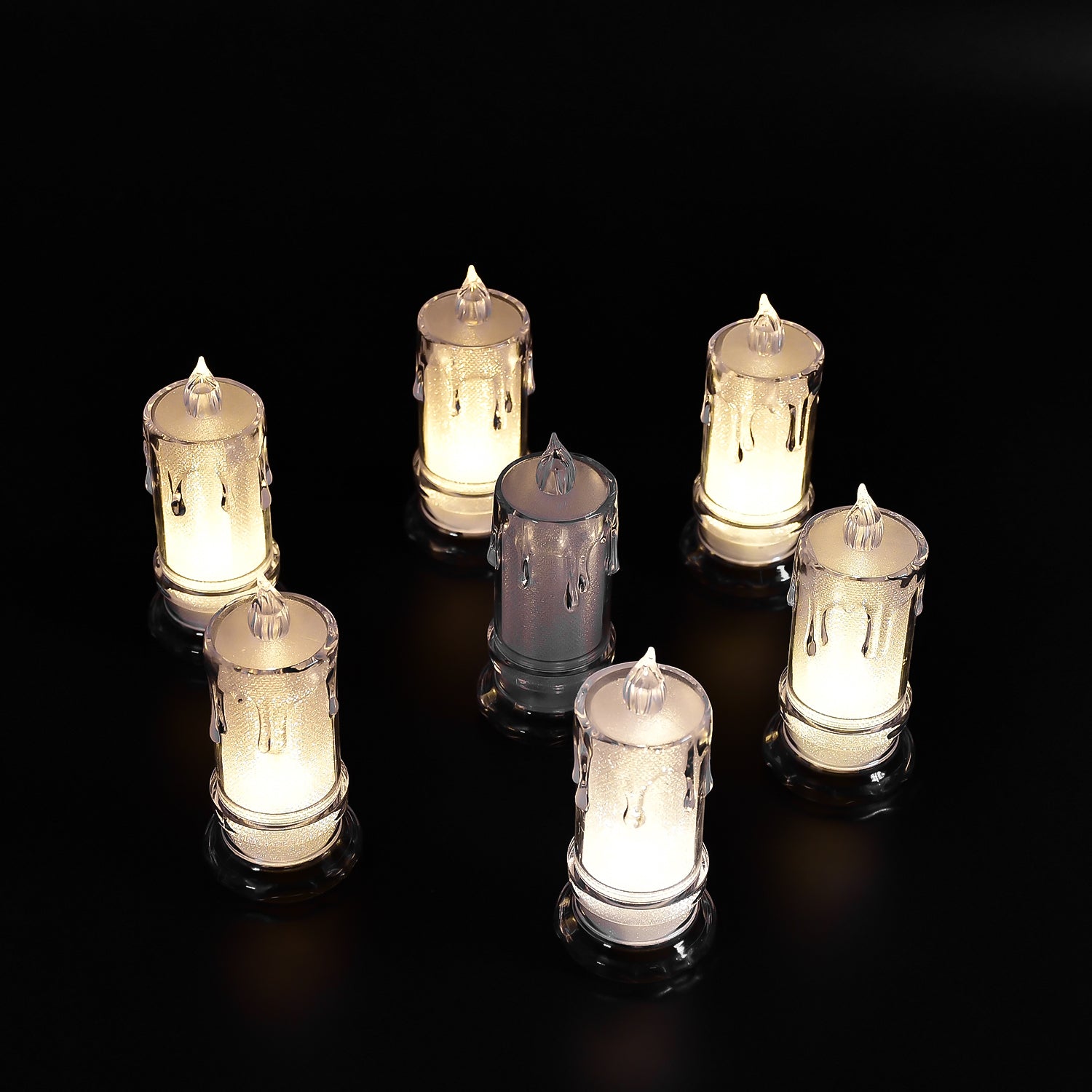 Large flameless candles with a melted design. Large flameless candles with a melted design.